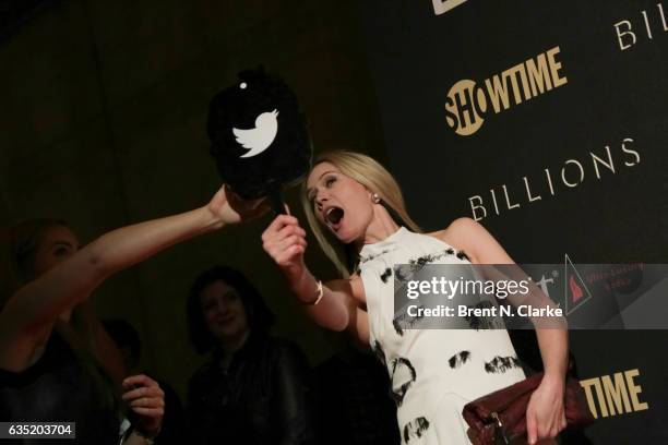 Actress Stephanie March sends out a "tweet" during Showtime's "Billions" Season 2 premiere held at Cipriani 25 Broadway on February 13, 2017 in New...