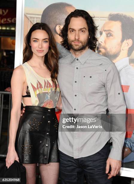 Cassi Colvin and Chris D'Elia attend the premiere of "Fist Fight" at Regency Village Theatre on February 13, 2017 in Westwood, California.