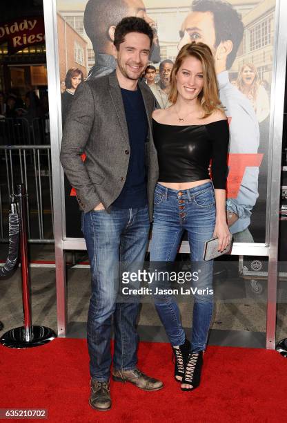 Actor Topher Grace and wife Ashley Hinshaw attend the premiere of "Fist Fight" at Regency Village Theatre on February 13, 2017 in Westwood,...