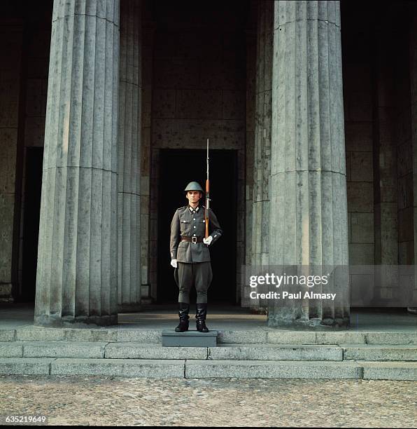 Soldiers guarding the Monument to the Victims of National Socialism, or Nazism, in East Berlin, Germany,1967. Called the Neue Wache, this building...