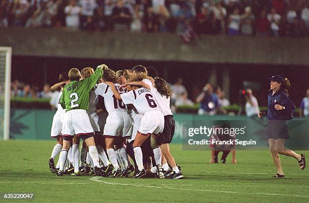 Team USA celebrates their victory over China in the Women's Soccer Final at the 1996 Olympics in Atlanta.