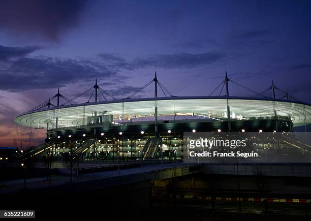 The Stade de France illuminated at night. | Location: St.-Denis, France.