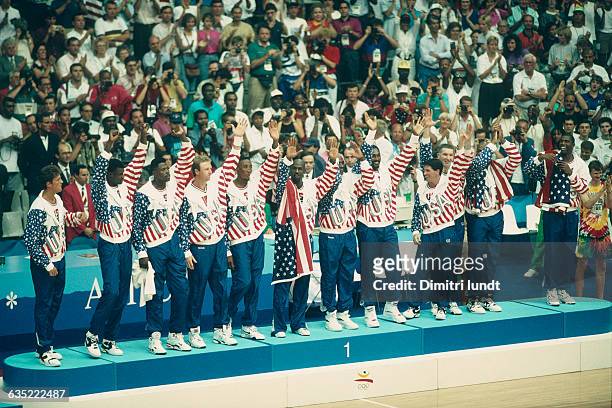 American basketball players of the Dream Team receive their gold medal during the 1992 Olympics. | Location: Barcelona, Spain.