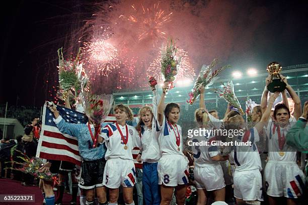 S players celebrate a 2-1 victory over China in the women's soccer tournament of the 1996 Summer Olympics.