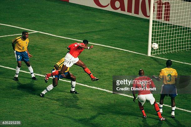 Patrick Kluivert scoring a goal for the Netherlands in the semi-finals of the 1998 FIFA World Cup, Brazil vs the Netherlands.