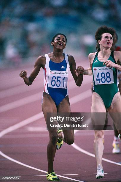 Marie-Jose Perec of France wins the Women's 400 meters at the 1992 Olympic Games. Olga Bryzgina finished second. | Location: Barcelona, Spain.