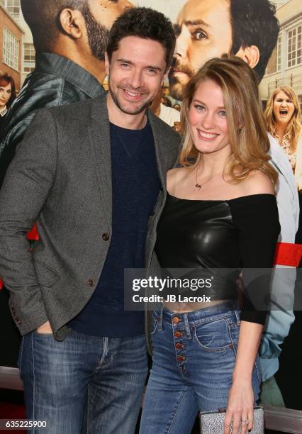 Topher Grace and Ashley Hinshaw attend premiere of Warner Bros. Pictures' 'Fist Fight' on February 13, 2017 in Westwood, California.