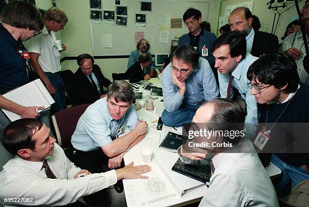 Scientists including astronomer Carl Sagan discuss the images of Neptune's moon Triton that were taken by the Voyager 2 probe. | Location: near...