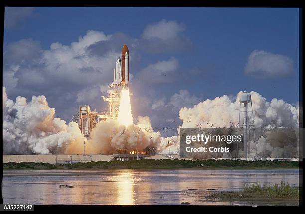 The space shuttle Discovery lifts off its launch pad at the Kennedy Space Center in September of 1988. This is the first shuttle launch since the...