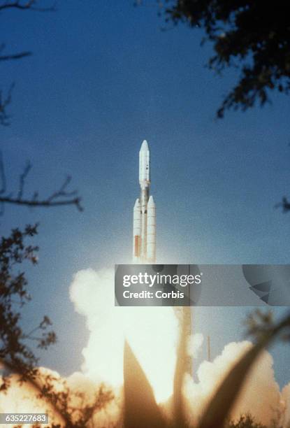 Titan III Centaur rocket blasts off with a Voyager spacecraft on a mission to explore the solar system.