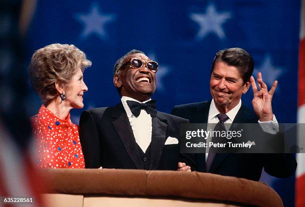 President Ronald Reagan shares the podium at the Republican National Convention, where he is campaigning for a second term as President, with his...