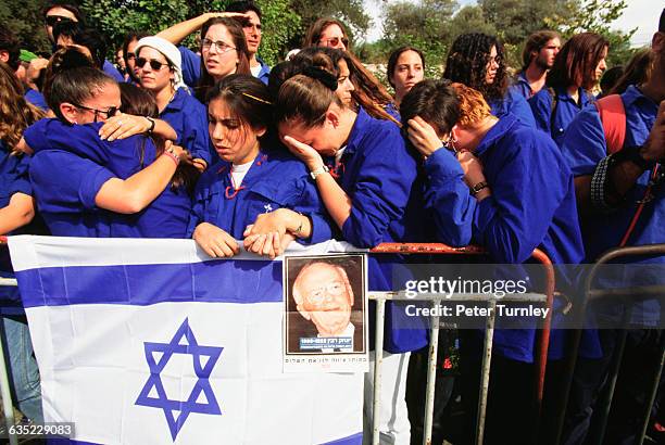 Women at a funeral in Jerusalem mourn the assassination of Israeli Prime Minister Yitzhak Rabin.