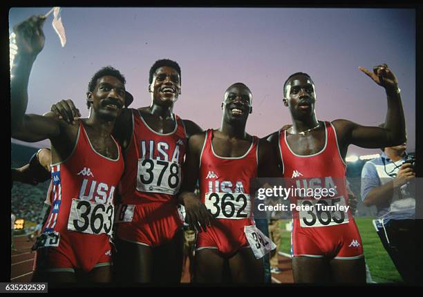 Carl Lewis, #378, smiles with other members of the American 4x100 meter hurdle relay team at the 1986 Goodwill Games, the very first year of the...