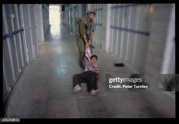 Palestinians and Israelis clash on the streets of Hebron on the day of the signing of an accord granting the city self-rule. One of the oldest cities...