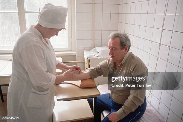 Nurse Giving Psychiatric Patient a Shot