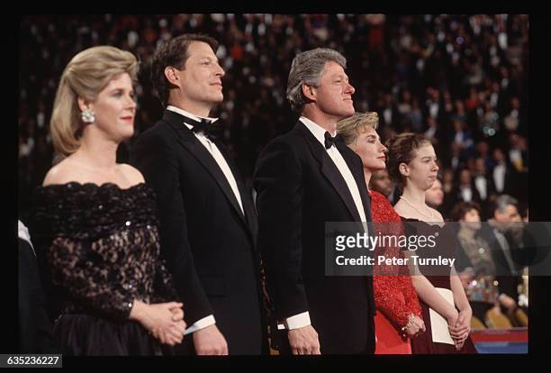 Tipper Gore, Vice President-elect Al Gore, President-elect Bill Clinton, Hillary Clinton, and Chelsea Clinton watch an event at a preinaugural gala...