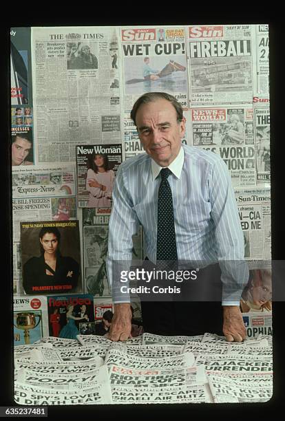 Publishing magnate Rupert Murdoch with sample newspapers and magazines put out by his international conglomerate at the offices of the New York Post....
