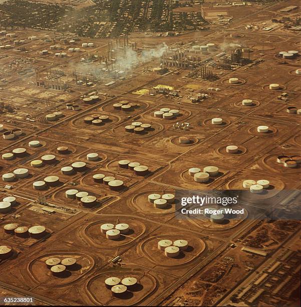 From this aerial view, the many oil tanks at the Abadan Refinery can be seen.