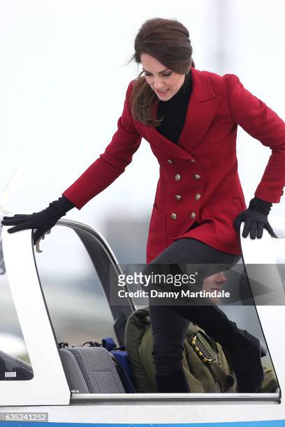 Catherine, Duchess of Cambridge is seen in a plane during a visit to the RAF Air Cadets at RAF Wittering on February 14, 2017 in Stamford, England....