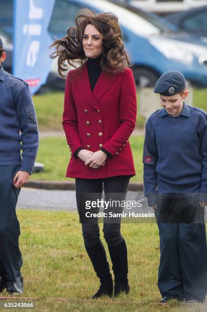 Catherine, Duchess of Cambridge takes part in a training exercise during a visit to the RAF Air Cadets at RAF Wittering on February 14, 2017 in...