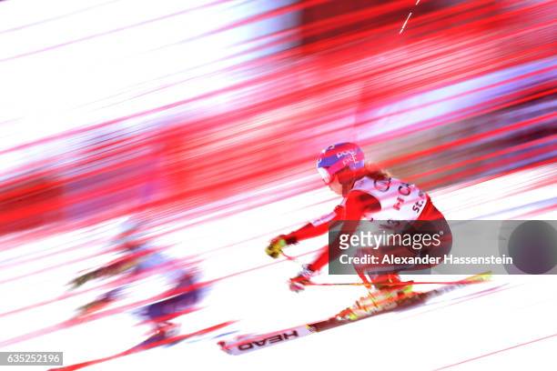 Candace Crawford of Canada competes with Megan Mc James of USA at the Alpine Team Event during the FIS Alpine World Ski Championships on February 14,...