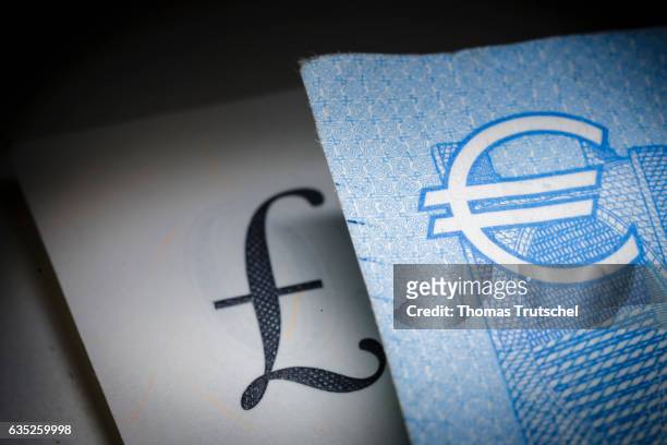 Berlin, Germany In this Photo Illustration pound sterling and Euro bills lying on a table on February 14, 2017 in Berlin, Germany.