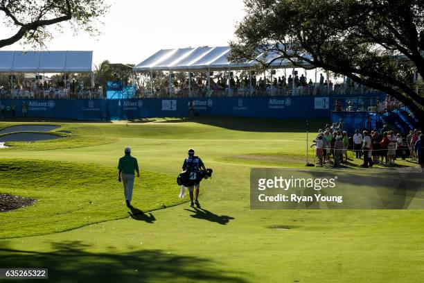 Fred Couples and his caddy walk up the 18th fairway during the second round of the PGA TOUR Champions Allianz Championship at The Old Course at...