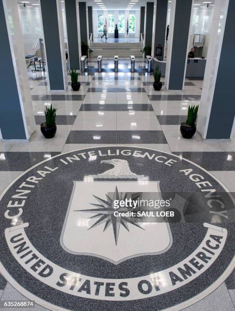 The Central Intelligence Agency seal is displayed in the lobby of CIA Headquarters in Langley, Virginia, on August 14, 2008. AFP PHOTO/SAUL LOEB