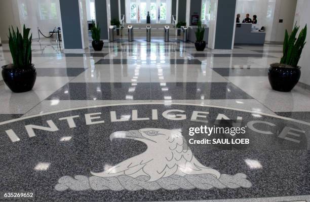 The Central Intelligence Agency seal is displayed in the lobby of CIA Headquarters in Langley, Virginia, on August 14, 2008. AFP PHOTO/SAUL LOEB