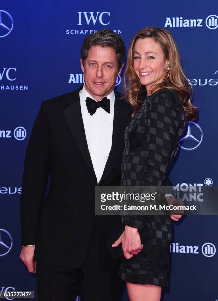 Host Hugh Grant and Anna Eberstein attend the 2017 Laureus World Sports Awards at the Salle des Etoiles,Sporting Monte Carlo on February 14, 2017 in...