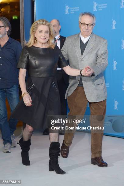 Actress Catherine Deneuve and Director of the festival Dieter Kosslick attend the 'The Midwife' photo call during the 67th Berlinale International...