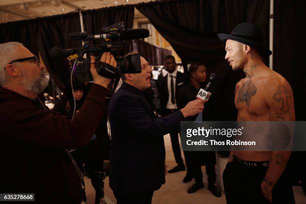 Model Jeremy Meeks gives and interview backstage for the Philipp Plein Fall/Winter 2017/2018 Women's And Men's Fashion Show at The New York Public...