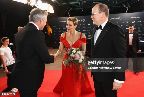 Prince Albert II of Monaco and his Charlene,Princess of Monaco are greeted at the red carpet by Laureus Academy Chairman Sean Fitzpatrick the 2017...