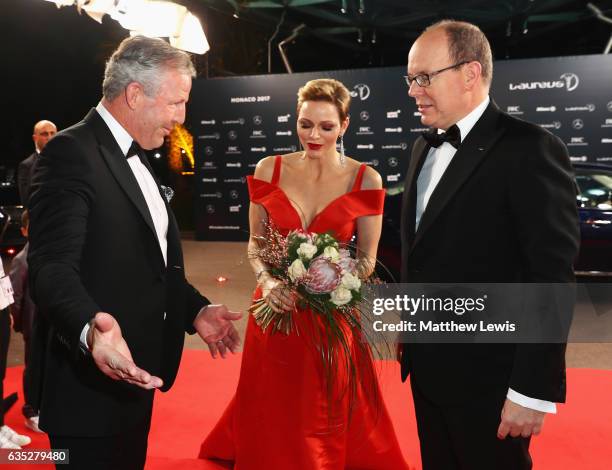 Prince Albert II of Monaco and his Charlene,Princess of Monaco are greeted at the red carpet by Laureus Academy Chairman Sean Fitzpatrick the 2017...