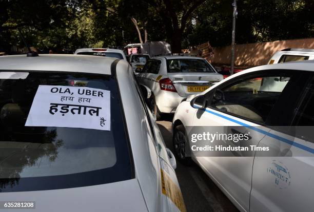 Taxi stranded as Ola, Uber drivers sitting on dharna at Jantar Mantar on February 14, 2017 in New Delhi, India. For the last five days, cab...