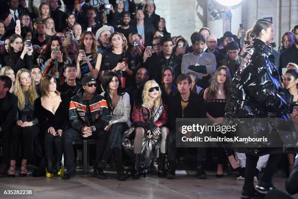 Carine Roitfeld, Tyga, Kylie Jenner, Madonna and Steven Klein attend the Front Row for the Philipp Plein Fall/Winter 2017/2018 Women's And Men's...