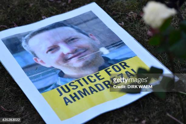 Photo taken on February 13, 2017 shows a flyer during a protest outside the Iranian embassy in Brussels for Ahmadreza Djalali, an Iranian academic...