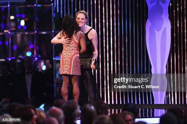 Laureus Ambassador Missy Franklin on stage welcomes Gymnast Simone Biles of the US the winner of the Laureus World Sportswoman of the Year Award...