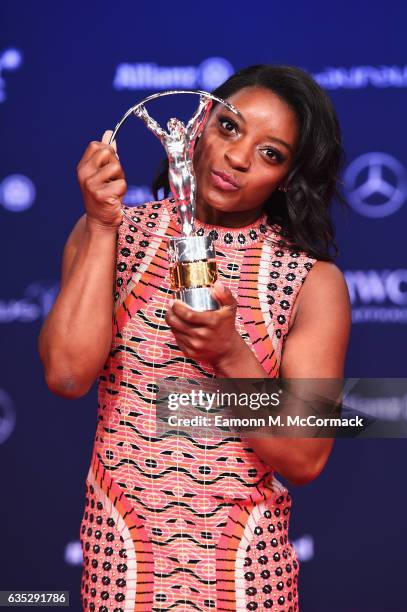 Winner of the Laureus World Sportswoman of the Year Award Gymnast Simone Biles of the US poses with her trophy the Winners Press Conference and...