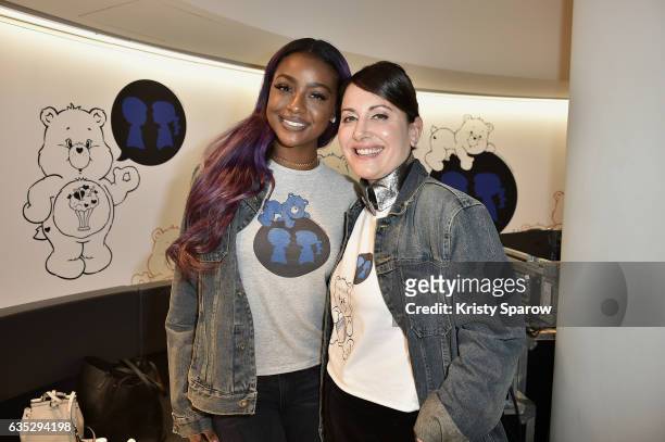 Justine Skye and Stacy Igel pose during the Boy Meets Girl x Care Bears Collection at Colette on February 14, 2017 in Paris, France.