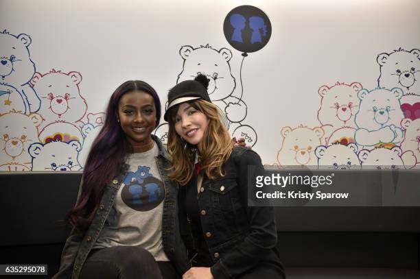 Justine Skye poses with a fan during the Boy Meets Girl x Care Bears Collection at Colette on February 14, 2017 in Paris, France.