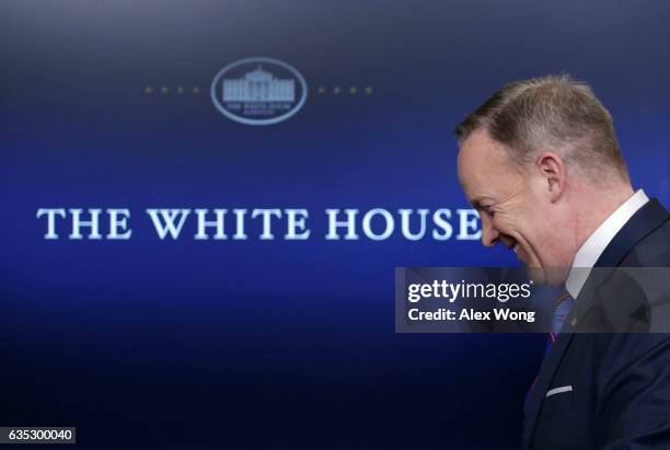 White House Press Secretary Sean Spicer leaves after a daily press briefing at the James Brady Press Briefing Room February 14, 2017 at the White...