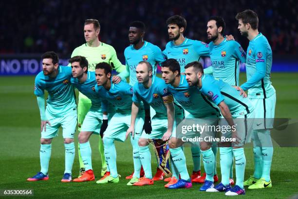 The Barcelona players line up for a team photograph before the UEFA Champions League Round of 16 first leg match between Paris Saint-Germain and FC...