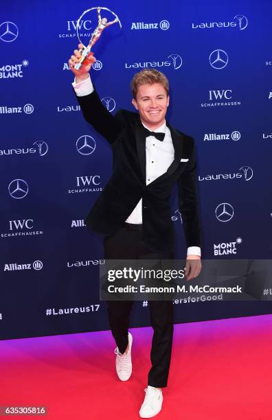 Winner of the Laureus World Breakthrough of the Year Award F1 Driver and Laureus Ambassador Nico Rosberg of Germany poses with his award at the...