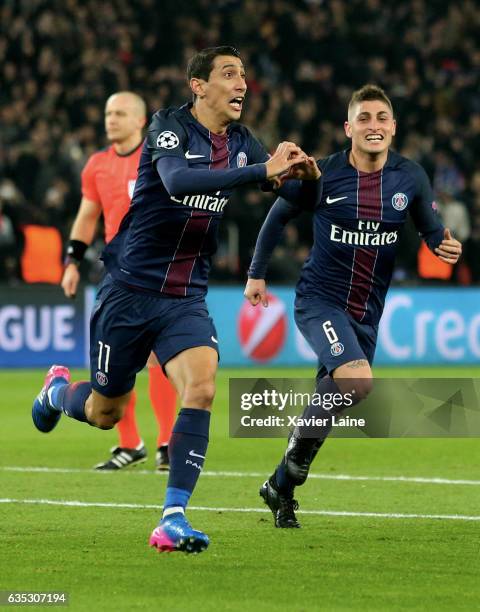 Angel Di Maria of Paris Saint-Germain celebrates his goal with Marco Verratti during the UEFA Champions League Round of 16 first leg match between...