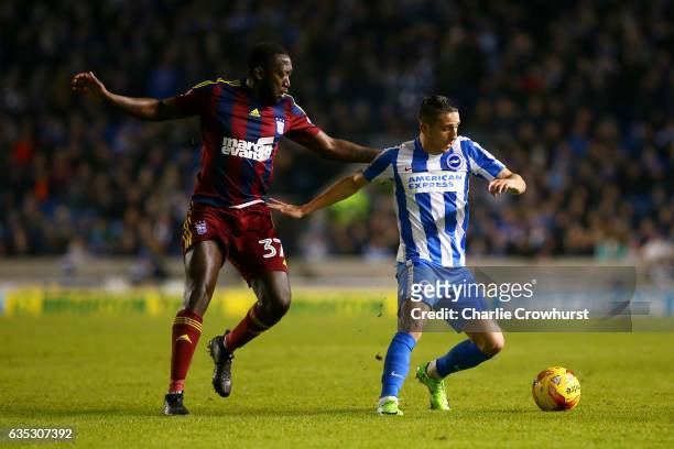 Anthony Knockaert of Brighton & Hove Albion battles for the ball with Toumani Diagouraga of Ipswich Town during the Sky Bet Championship match...