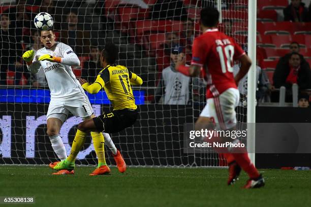 Benfica's Brazilian goalkeeper Ederson Moraes vies with Dortmund's forward Aubameyang during the Champions League football match between SL Benfica...