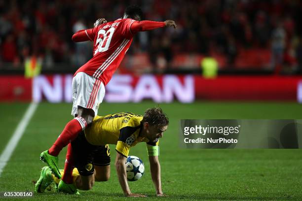 Benfica's midfielder Nelson Semedo vies with Dortmund's defender Sokratis Papastathopoulos during the Champions League football match between SL...