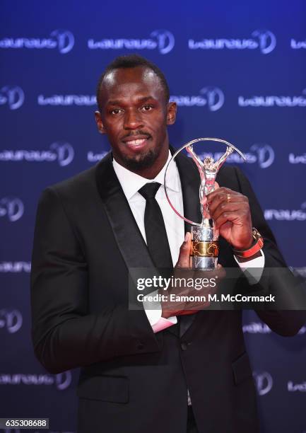 Winner of the Laureus World Sportsman of the Year Award Athlete Usain Bolt of Jamaica poses with his trophy at the Winners Press Conference and...