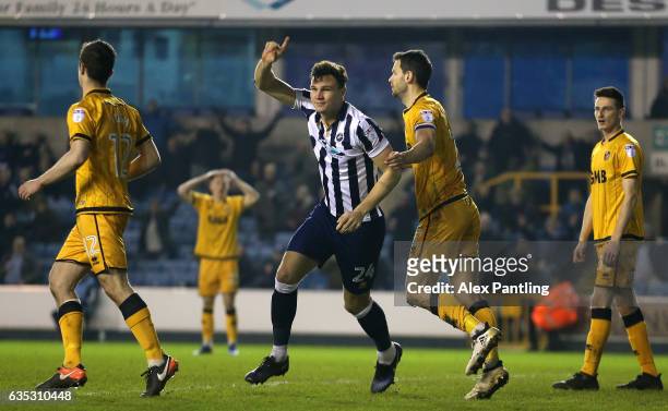 Jake Cooper of Millwall celebrates after scoring his sides second goal during the Sky Bet League One match between Millwall and Port Vale at The Den...